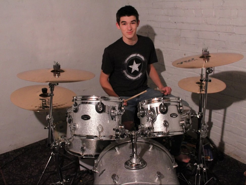 Jacob playing drums